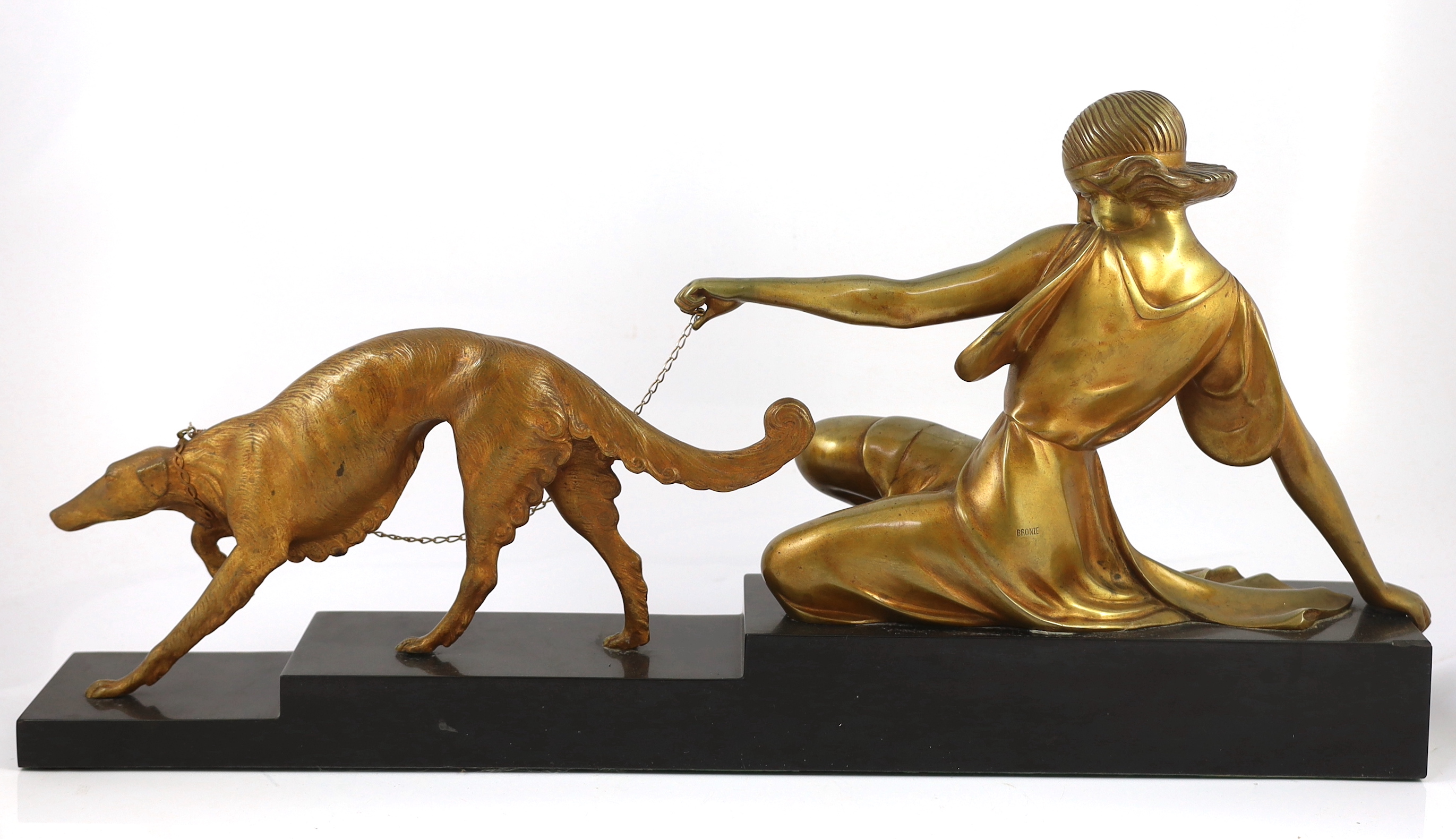 Armand Godard (1824-1887). A French Art Deco bronze group of a seated maiden with a borzoi upon a leash, 78cm long, 12.5cm deep, 36cm high